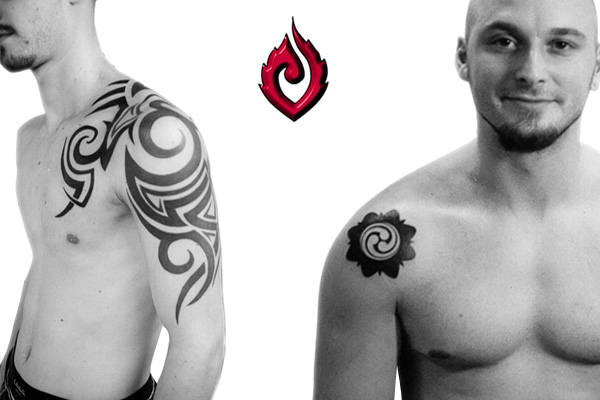 It's a showdown between the large Thai-themed back tattoos. It's a showdown between the large Thai-themed back tattoos.
